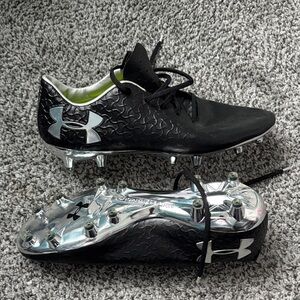 Soccer cleats Under Armour Black and Metallic 
Men 7 / women 8    brand new